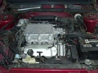 There is definitely room to add a turbo somewhere in here... Photo from cardomain.com
